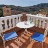 Sun terrace and view over the hills of the Axarquia