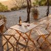 Terrace in the evening Terrace with chairs and table in the setting warm sun of Spain