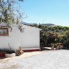Parking area, house and view of Cortijo Marrillo to buy