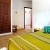 Green Double Guest Bedroom The green bedroom for guests offers a double size bed and a lot of space