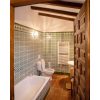 Bathroom A has a bathtub, toilet and washbasin and is equipped with an electric heater 