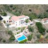 Drone view Drone view of Cortijo La Zapatera with houses and pool