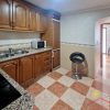 Fully equipped kitchen with access to the living room