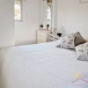Slaapkamer 3 Slaapkamer 3 met tweepersoonsbed en een klein raam