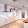 Modern white kitchen fully equipped