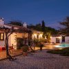 Photo of the Finca in the night with a light up romantic terrace