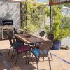 Lower terrace is covered and offers a lot of space and provides a sitting area Lower terrace offers a lot of space and provides a sitting area