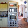 Nice kitchen with breakfast bar Kitchen with round arch entrance