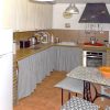 Kitchen The kitchen is fully equipped and with a dining table