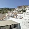 View roof terrace The view from the roof terrace is over the upper village of Canillas de Aceituno and the mountains behind