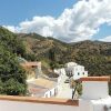 Von der Dachterrasse aus kann man entlang der Calle Granada von Sedella sehen