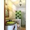 Green Bathroom Ensuite  The green bathroom si tiled in green and has a shower