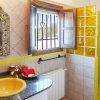 The yellow bathroom has its own window