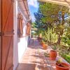 Back terrace Back terrace of Casa Coppe in the sun with some pots and plants