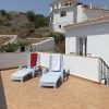 Sunny roof terrace with deck chairs of Casa Montaña in Sedella