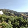 Uitzicht langs Sedella naar het Andalusische landschap