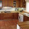 Kitchen fully equipped in wood with big sink