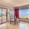 Large patio door and large window shows beautiful view of landscape