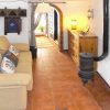 Reception Reception with sofa and rustical log burner.