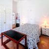 Master bedroom Master bedroom with double bed, built-in closets, and shelving units