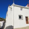 Front view of Casa Calle Terenias 14 the house for sale in Sedella at the Costa del Sol
