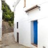 Photo of traditional front elevation of house for sale in Calle Granada no .1 in the white village of Sedella