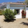 Front Front of Casa Churrispa in Sedella with Marroma mountain in the back.