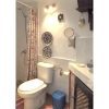 Rustical shower room with toilette end corner basin 