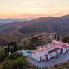 View from above over Finca La Cencerra for sale and the hills around Sedella.